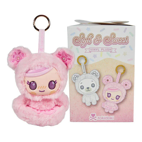 A pastel Tokidoki Soft & Sweet Vinyl Plush keychain with a cute bear hood sits next to its Tokidoki-branded blind box displaying product images.