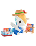 A tokidoki Farmers Market Unicorno Blind Box figurine in overalls and a hat sits by jam jars, capturing the spirit of a market scene—a charming collectible from tokidoki for any collection.
