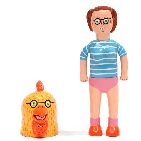 A toy figure dressed in a striped shirt and pink shorts stands next to a chicken head accessory, both designed with glasses and a similar aesthetic. The product is About Animals Usami Piyon — Chicken 1st Version by Paradise Toy (TW).