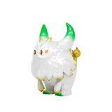 The Little Hut (HK) Rangeas Rex Jr. — White & Gold is a collectible toy showing a furry, horned creature with green-tipped horns and feet, orange eyes, and a small yellow cat-like figure on its back against a white background.