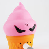 The Smorkin' Monger Jerome - Strawberry by Squibbles Ink + Rotofugi (US) is a collectible toy ice cream cone with a pink swirl top and intimidating black eyes, reminiscent of Frank Kozik's edgy designs, featuring a base that expertly mimics a classic waffle cone.