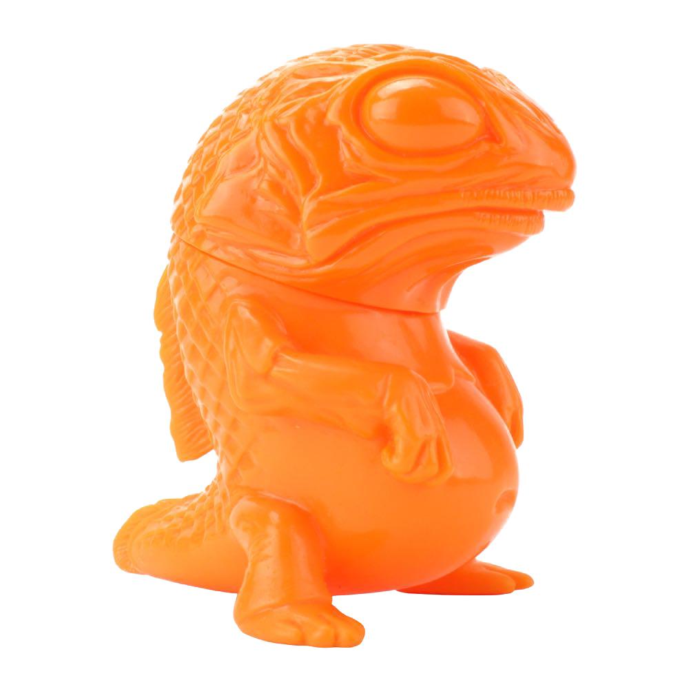 A Snybora - Unpainted/DIY orange lizard on a white background, sculpted by hand, by Squibbles Ink + Rotofugi (US).