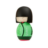 The Soul Momiji Doll - Green from Momiji (UK) is a small, decorative doll with black hair and a green kimono featuring floral patterns, and it conceals a secret message inside.