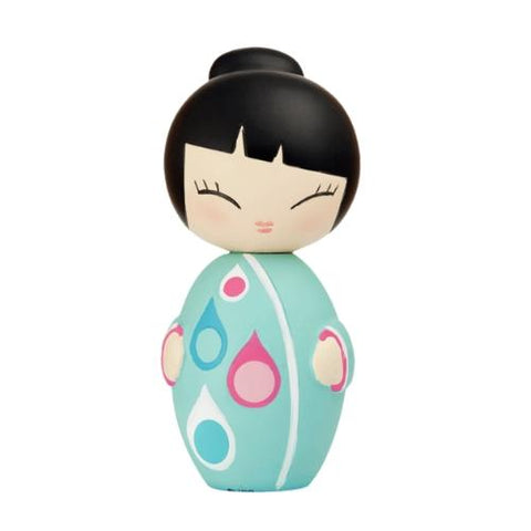 The Little Star Momiji doll, from the UK brand Momiji, features black hair and a turquoise dress decorated with colorful teardrop patterns. Made from handpainted resin, it contains a secret message inside, enhancing its delightful charm with an element of surprise.