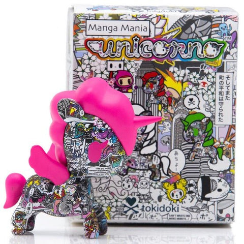 A pink Tokidoki unicorn in front of a Manga Mania Unicorno Blind Box.