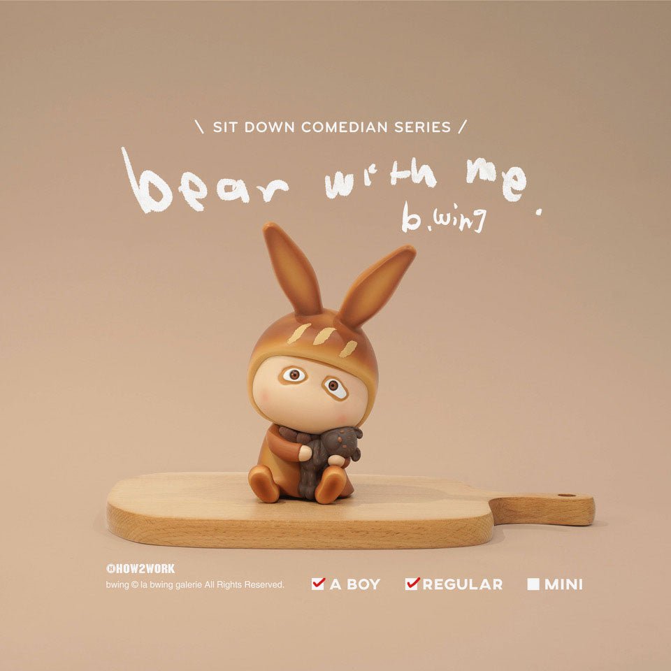 A small figurine of a bunny with the words 
