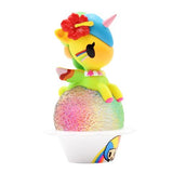 A Delicious Unicorno Blind Box by tokidoki is perched on top of a dessert-themed ice cream cone.