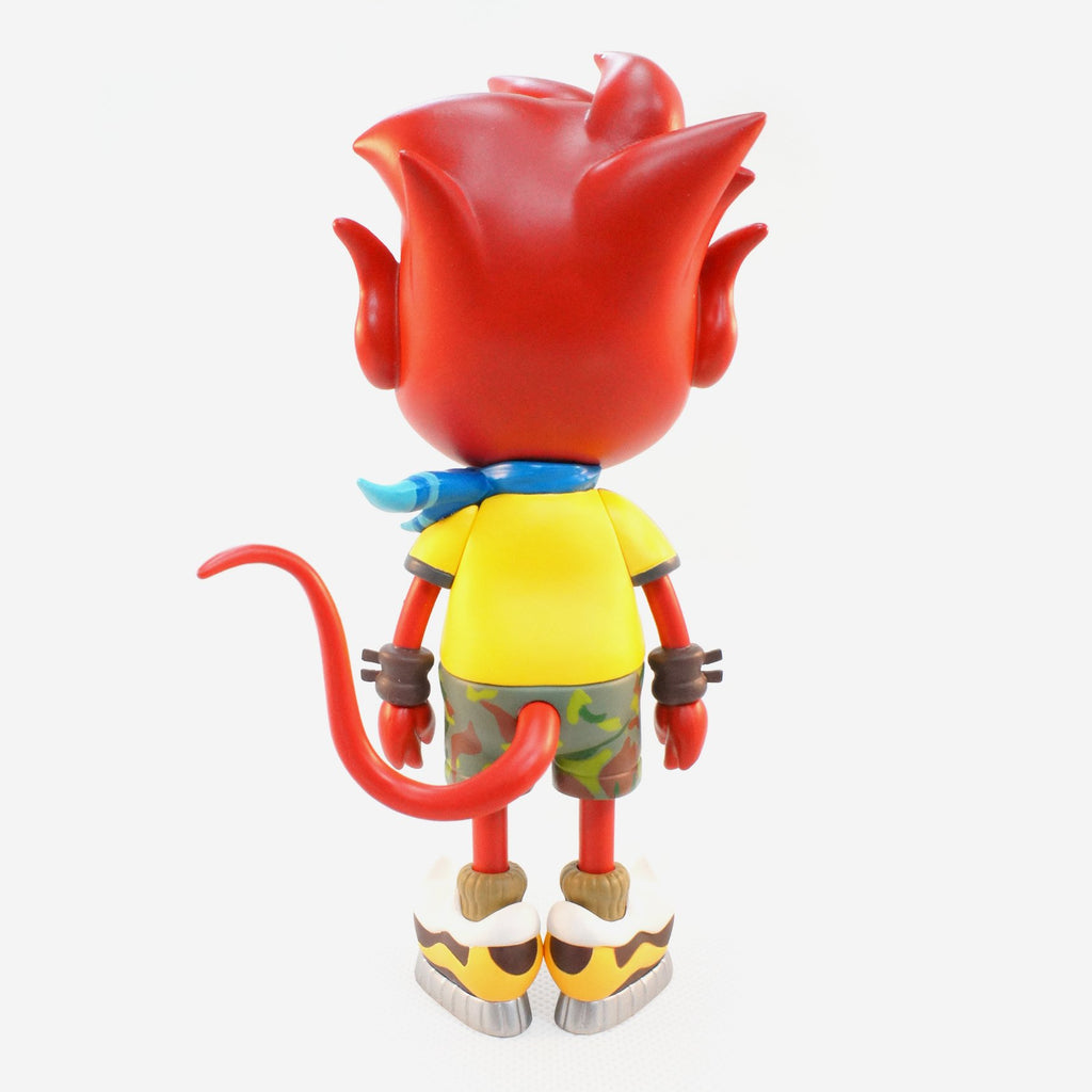 A Urban Devil figure designed by a Taiwan-based artist, wearing a bright yellow shirt.