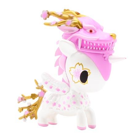 A tokidoki Unicorno Series X Blind Box with pink hair and a gold crown.