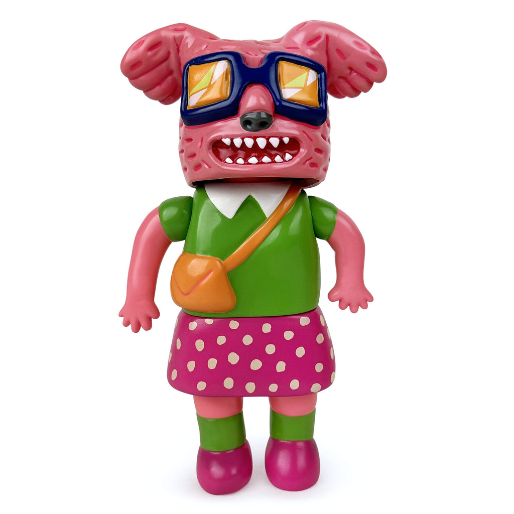A Koala Obasa toy with glasses and a polka dot dress in pink designed by Paradise Toy (TW) at DesignerCon 2022.