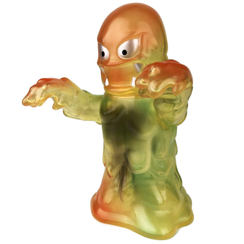 A Rumble Monsters Damnedron TK2 Exclusive toy with a translucent yellow face.