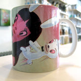 A ceramic mug with artwork by Gary Baseman featuring a cartoon character: Rotofugi's Gary Baseman Playboy Redux Mug.