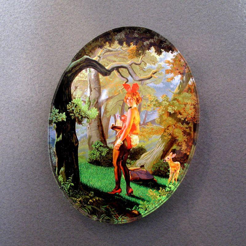A picture of a woman in a forest featured in the Ain Cocke Playboy Redux Acrylic Magnet exhibit by Rotofugi (US).