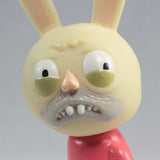 A Rabburt toy with an angry face, inspired by the character of the Tinder Toys line by Squibbles Ink + Rotofugi (US).