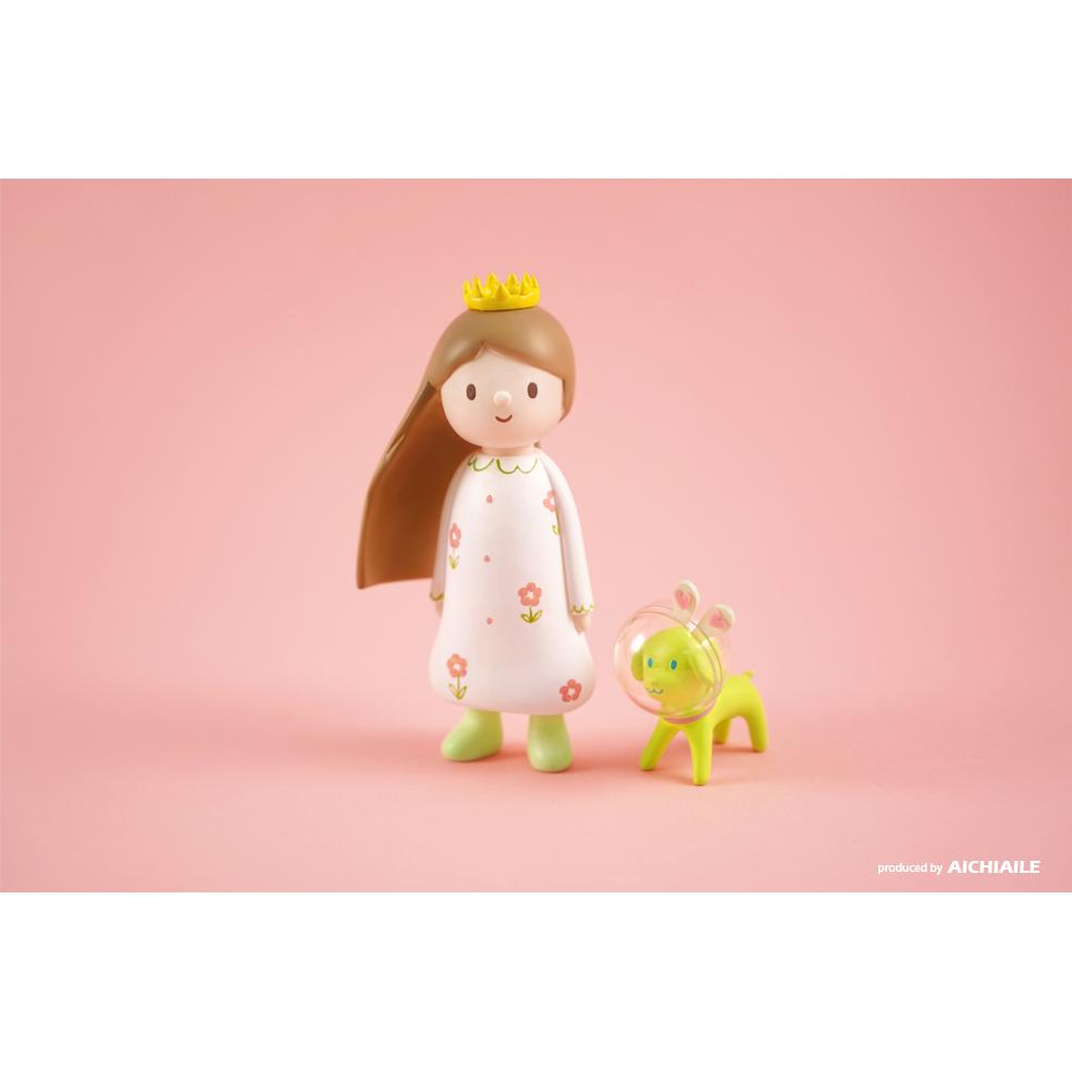 A small resin figure of Queency — Every Girl Has a Princess Dream and a dog on a pink background by AICHIAILE.