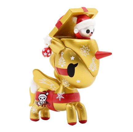 This gold unicorn figurine is part of the Holiday Unicorno Series 3 Blind Box, designed by tokidoki, bringing holiday cheer with a santa hat on top.