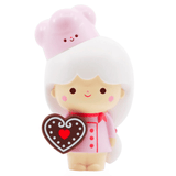 A little girl in a pink hat holds a Momiji Sweetie - 5 Inch by Momiji (UK).