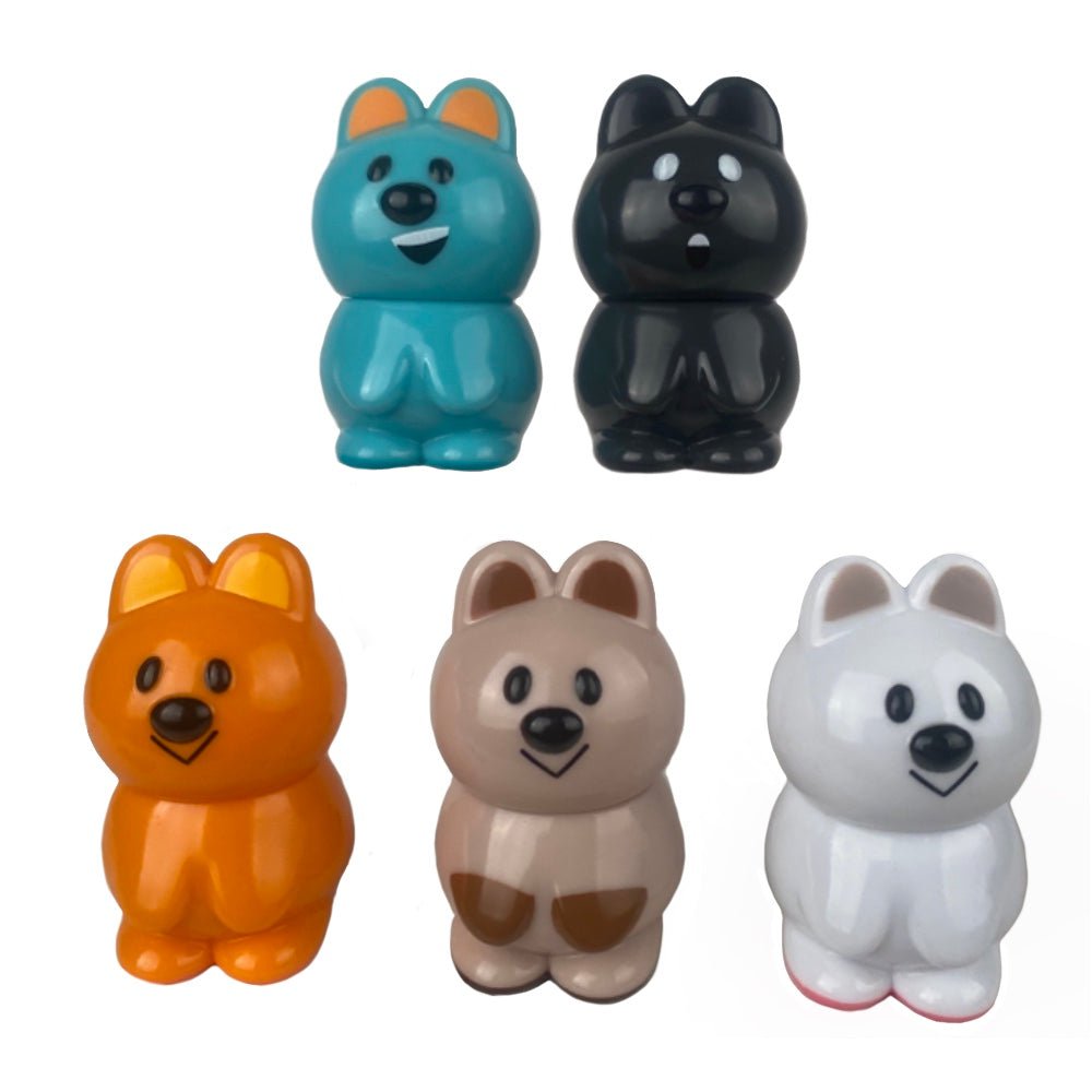 A collection of VAG 33 - Kuokka Chan plastic bears in various colors, perfect for gachapon figures fans by Medicom (JP).