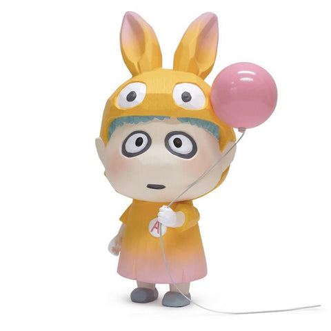 A character figurine of a bunny holding a balloon designed by How2Work (HK), called A Boy Shall We Fly? — Yellow.