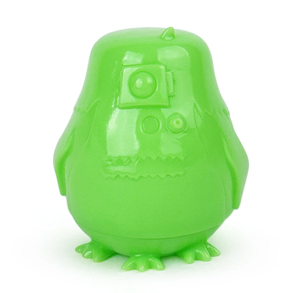 A green vinyl toy owl DRORGS — Ooze Edition by Science Patrol is sitting on a white background.