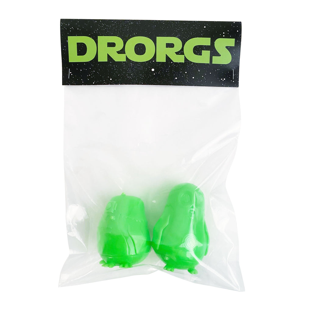 Two green DRORGS in a vinyl bag by Science Patrol.