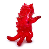 A limited edition red Negora Birthstone Collection — Garnet figurine of a cat with a chain by Konatsuya (JP).