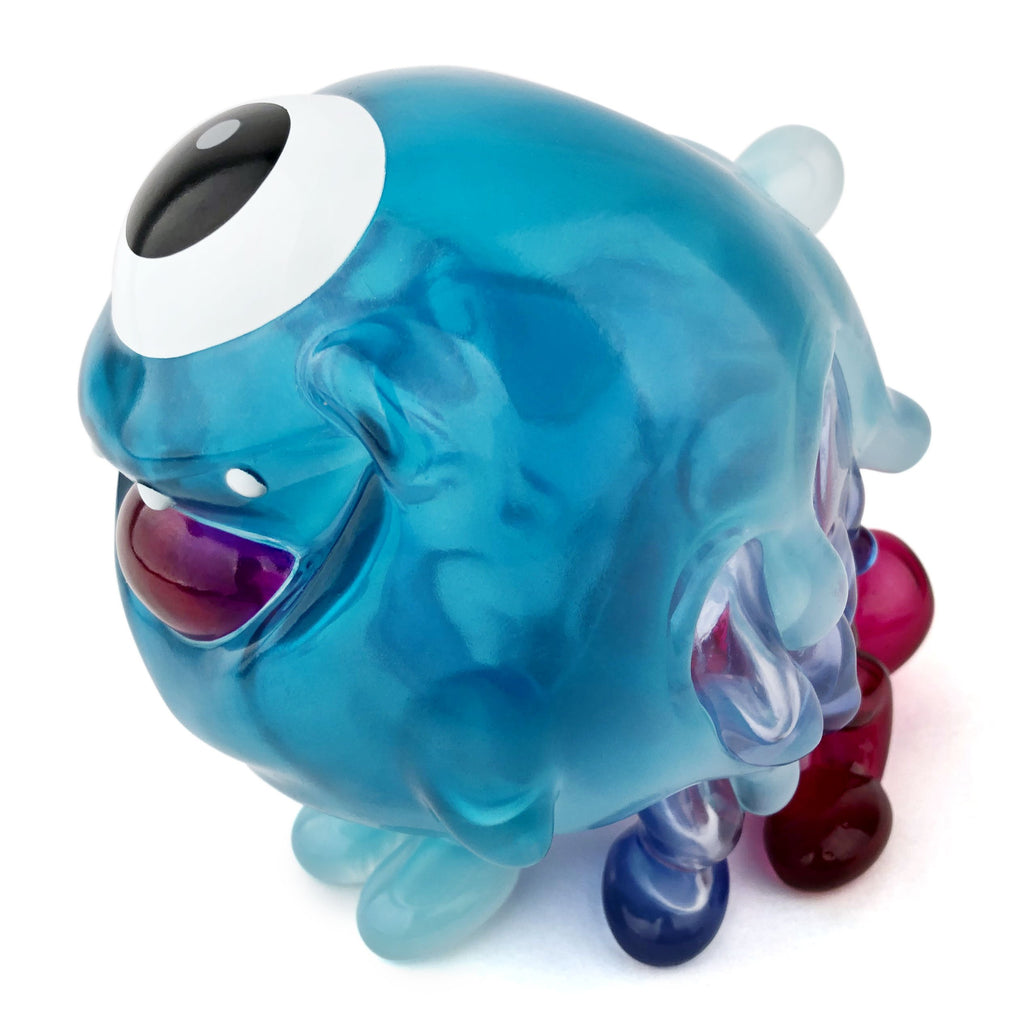 This blue and purple Gellog — Type-D (Rotofugi Exclusive) beast toy has a big eye.