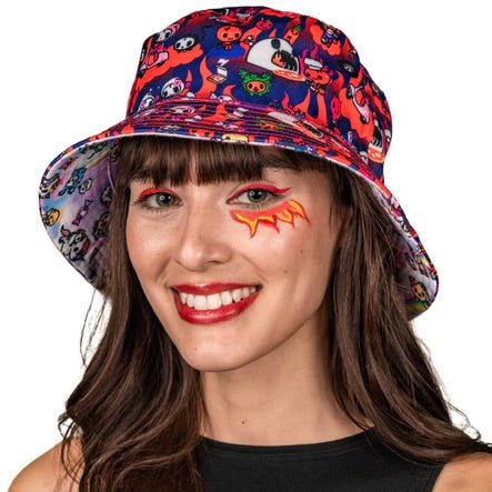 A woman wearing a Tokidoki Heavenly Reversible Bucket Hat with colorful Tokidoki characters.