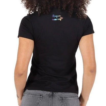 The back view of a woman wearing a Holographic Kitty Women's Tee by Tokidoki x Hello Kitty.