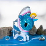 A tokidoki Unicorno After Dark Series 2 Blind Box toy shark with a princess inside.