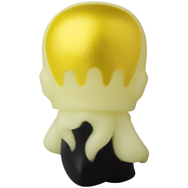 A VAG Series 28 — Kodakatsubon toy designed by Japanese vinyl toy artists with a yellow and black head. Made by Medicom (JP).