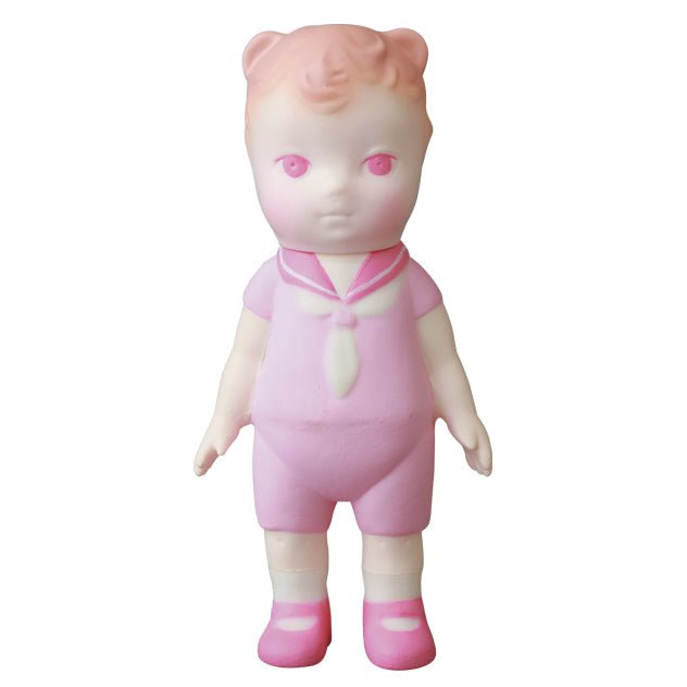 A pink doll with a pink bow on her head, inspired by Japanese vinyl toy artists, VAG 30 — Kumamimichan by Medicom (JP).