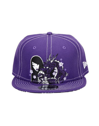 A Lavender Dragon Snapback hat with an embroidered image of a tokidoki character.