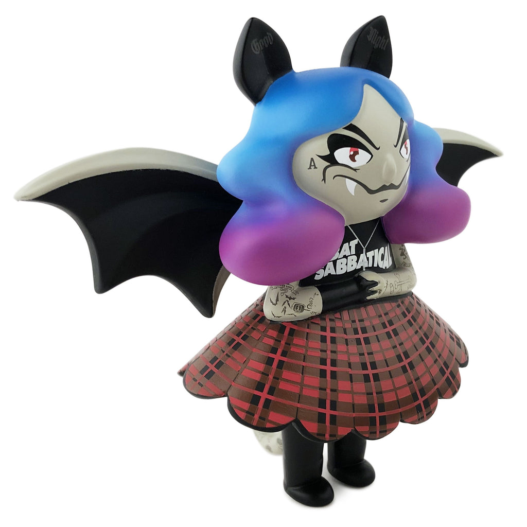 Limited edition Midnight Moon Bat figurine of a girl in a plaid skirt with bat wings designed by Igor Ventura from Martian Toys.