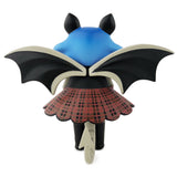 This limited edition figurine features a Bat Sabbatical with Free Print with blue wings and a plaid skirt designed by Igor Ventura, from Martian Toys (US).