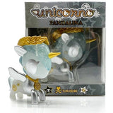 A collectible gold and silver tokidoki Pandalina Unicorno in a box.