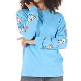 A woman wearing a blue Pearly Pony Unisex Long Sleeve Tee with Unicorno graphics by tokidoki.