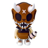 A limited edition Puck Little Painter — Sand Walker vinyl figure with horns and a bottle.