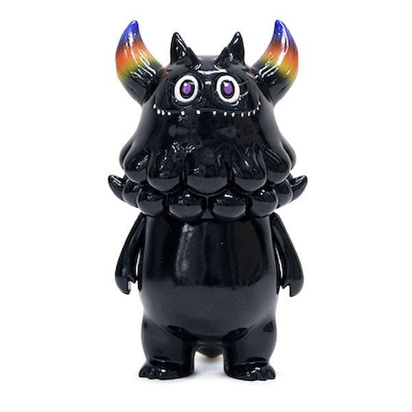 A black toy with horns, designed by The Little Hut (HK) in Hong Kong.